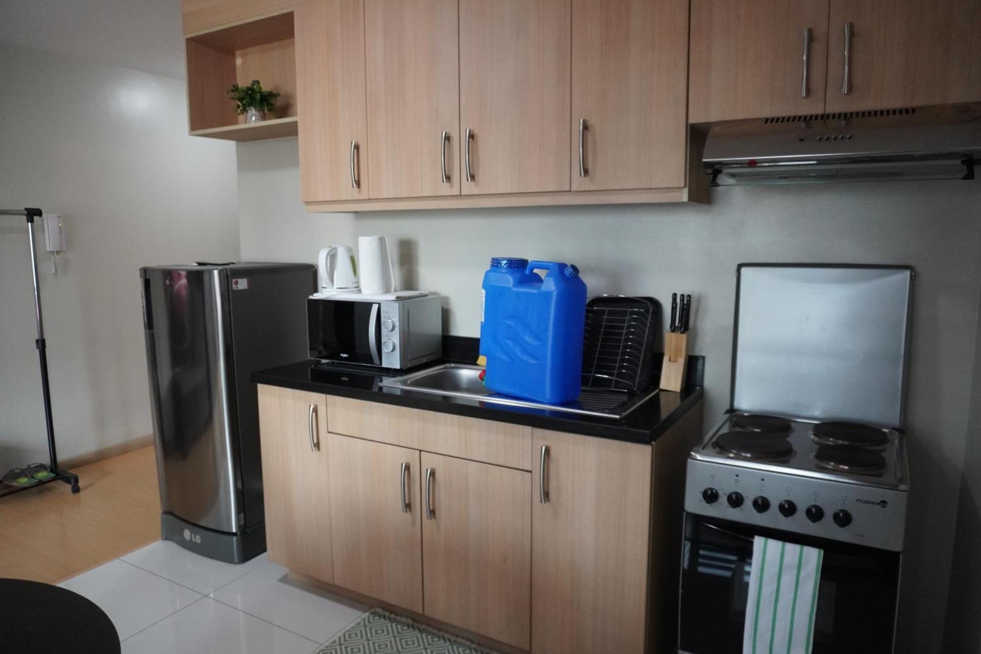 Avant Apartments At The Fort Тагиг Номер фото