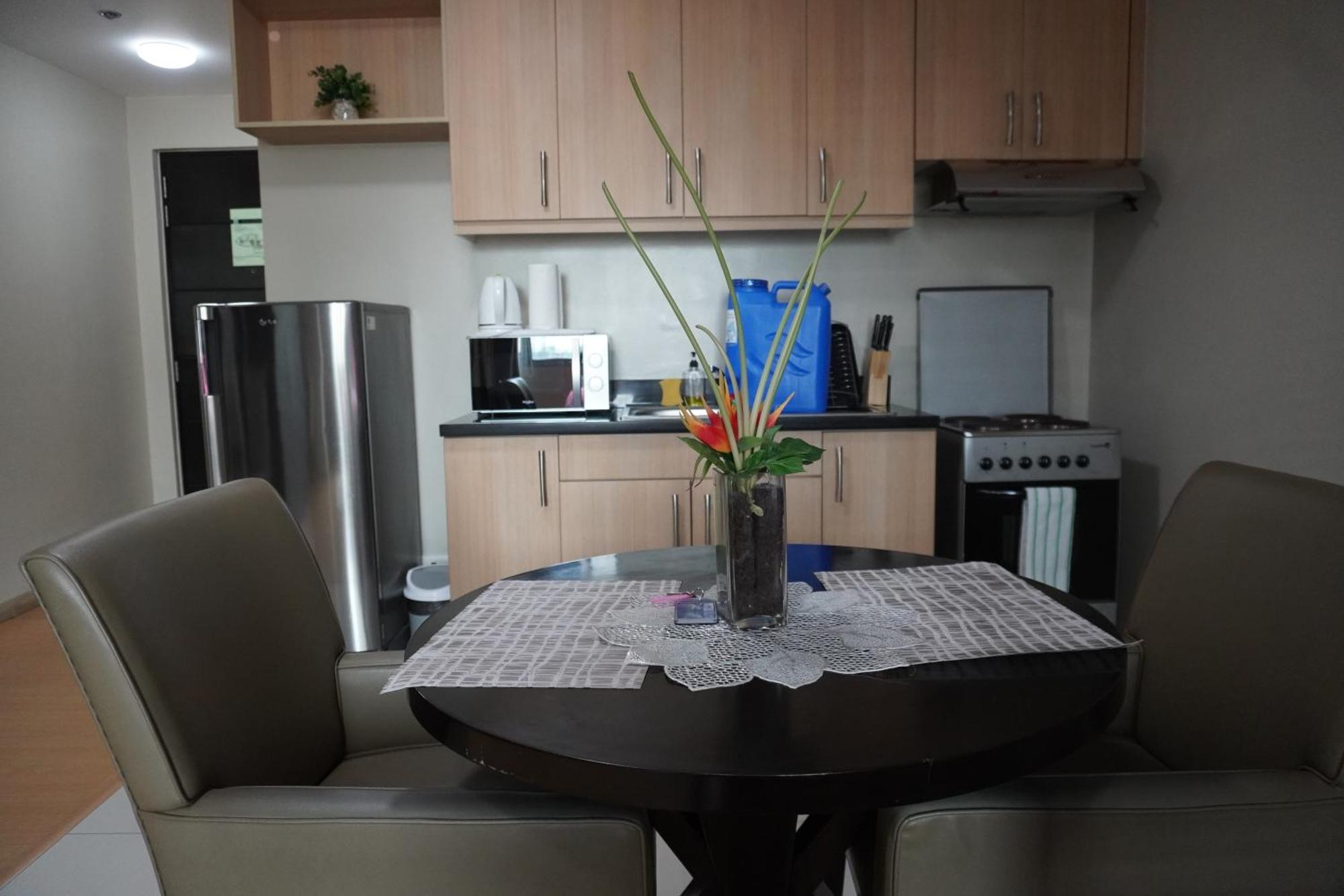 Avant Apartments At The Fort Тагиг Номер фото