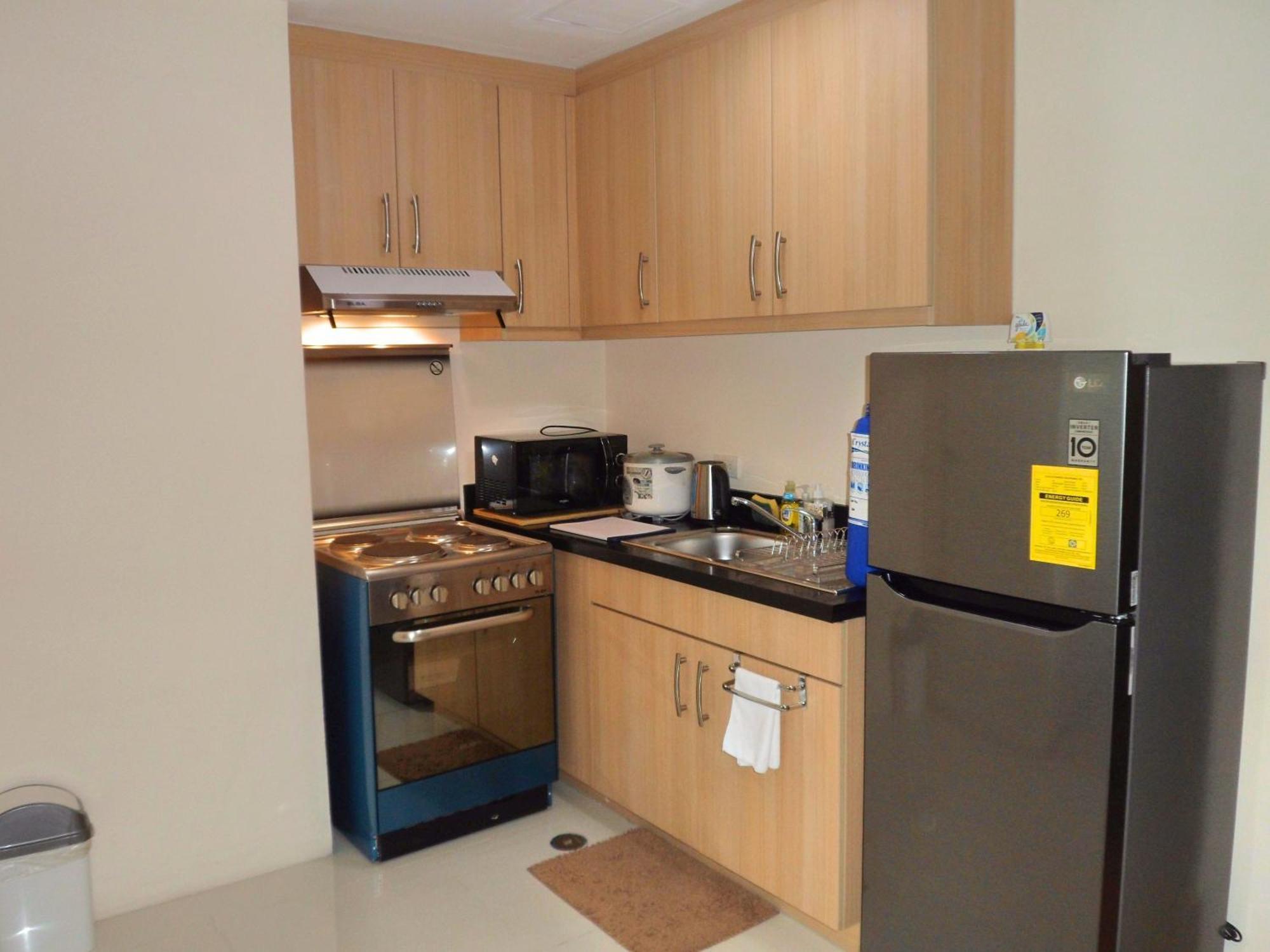 Avant Apartments At The Fort Тагиг Номер фото